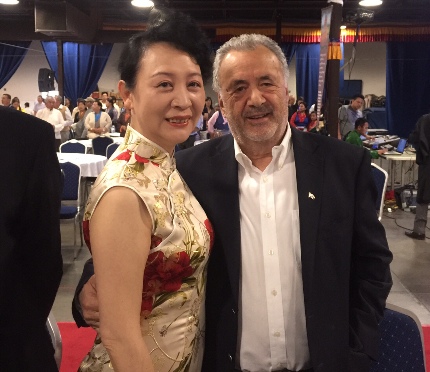 Sheng Xue and retired Canadian Senator Di Nino
